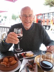 Alan with tapas and wine.